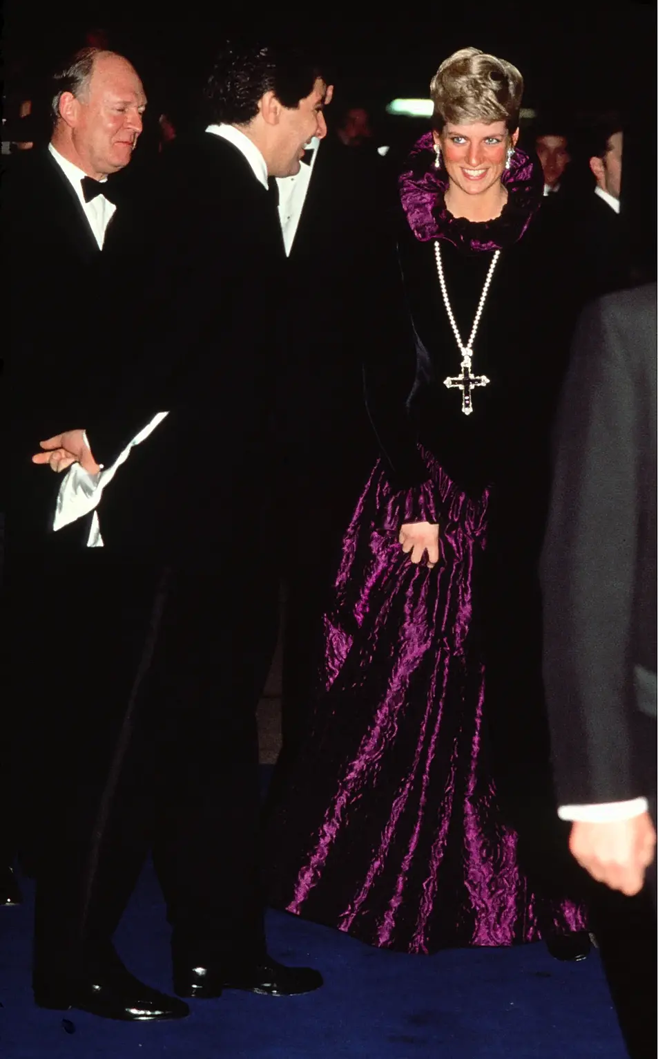 Diana attends charity gala in Elizabethan style dress and cross necklace 