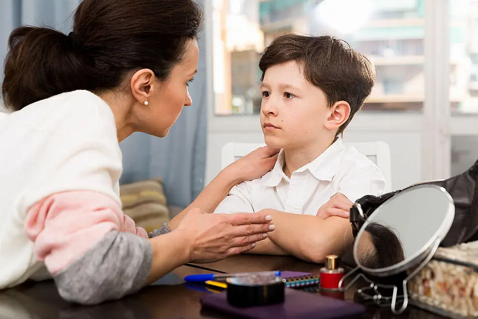 A mother having a serious conversations with her son