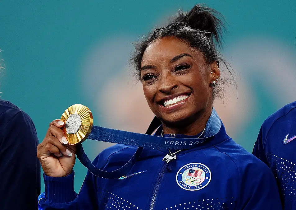 Simone Biles with her gold medal following the Women's All-Around Final at the Paris Olympics