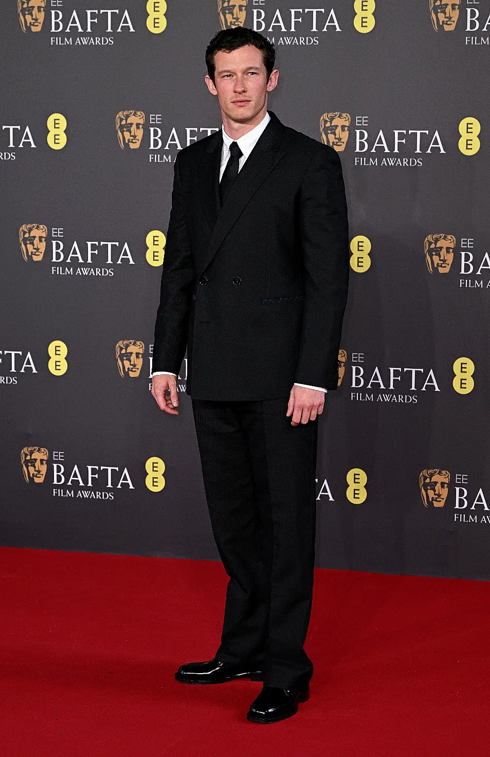 Callum Turner arriving at the 2024 EE BAFTA Film Awards