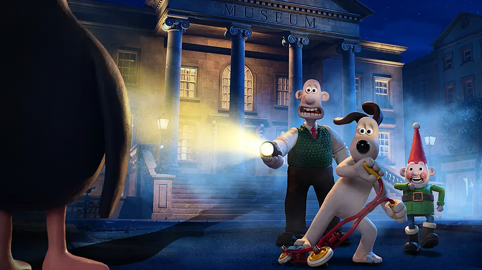 A scene from Wallace & Gromit: Vengeance Most Fowl showing Wallace holding a torch