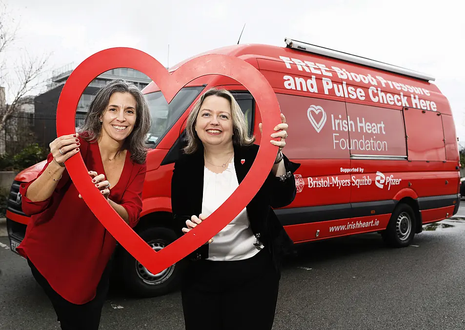 Deb Mangone, left, Country Manager, Pfizer Healthcare Ireland and Janis Morrissey, Director of Health Promotion, Irish Heart Foundation with the charity's mobile health unit