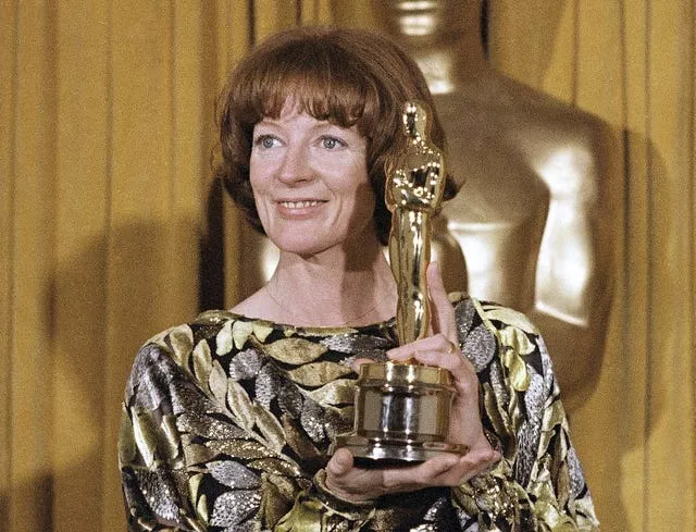 Dame Maggie Smith holds her Oscar for best supporting actress in California Suite in 1979