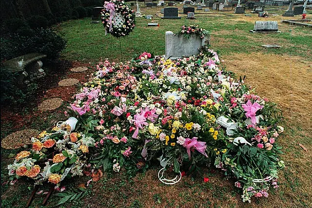 The gravesite of JonBenet Ramsey, covered with flowers