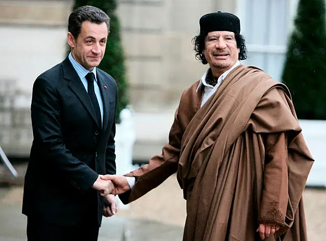 Sarkozy and the late Col Gaddafi in Paris in 2007