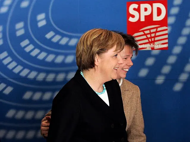 Angela Merkel, left, and Beate Baumann in 2006 