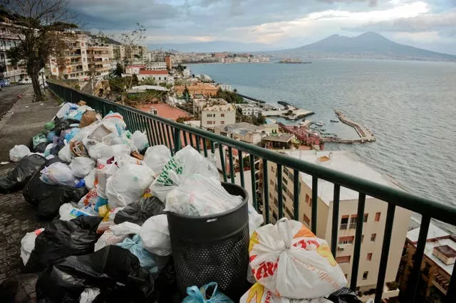 Uncollected reuse is piled up on a sidewalk in Naples, Italy, in 2010 