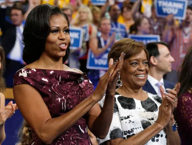 Former US first lady Michelle Obama, left, and her mother Marian Robinson