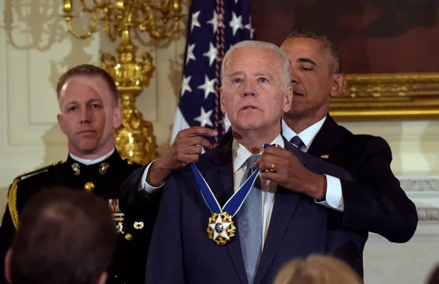 Then-president Barack Obama presents then-vice president Joe Biden with the Presidential Medal of Freedom