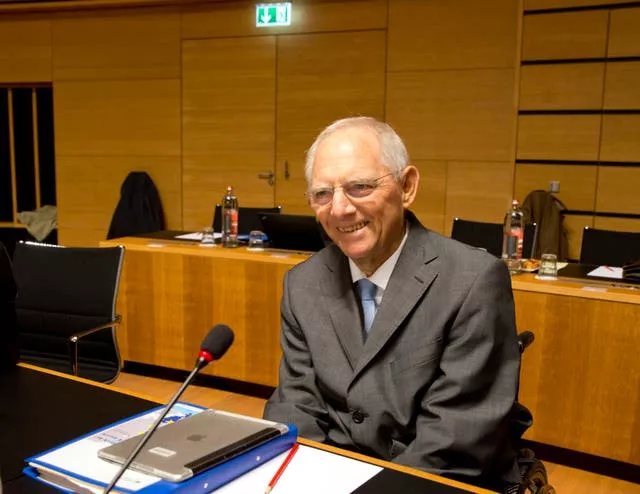 Then-German finance minister Wolfgang Schaeuble smiles as he attends a meeting of EU finance ministers in Luxembourg in 2017