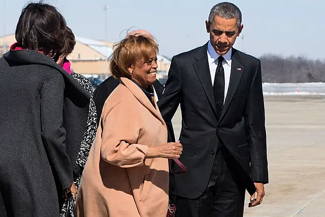 Marian Robinson boarding Air Force One with former US president Barack Obama