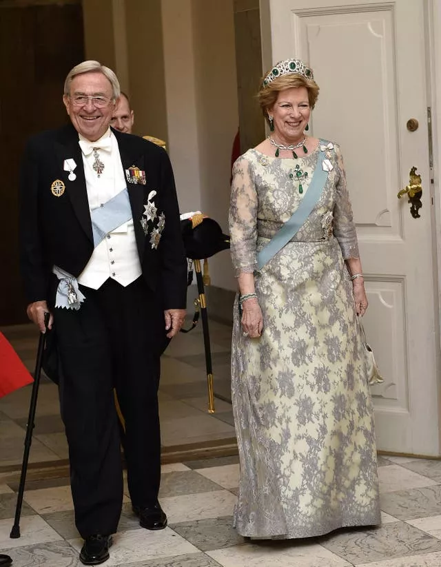 Former king Constantine II and his wife Anne-Marie arrive at a birthday dinner at Christiansborg Castle in Copenhagen in 2015