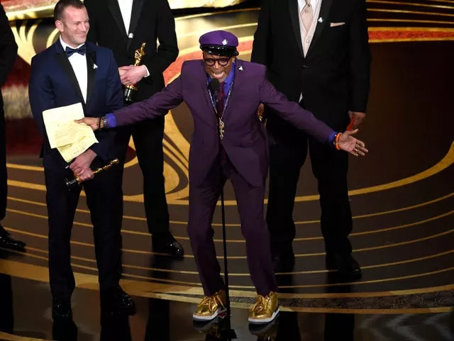 Spike Lee accepts the award for best adapted screenplay for BlacKkKlansman at the 2019 Oscars