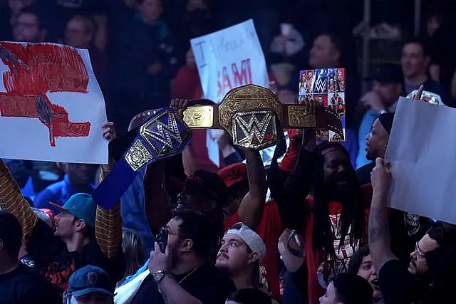 Wrestling fans cheer during the WWE Monday Night RAW event on March 6 in Boston 