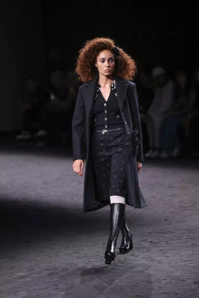 Adwoa Aboah wears a creation as part of the Chanel Fall/Winter 2023-2024 ready-to-wear collection
