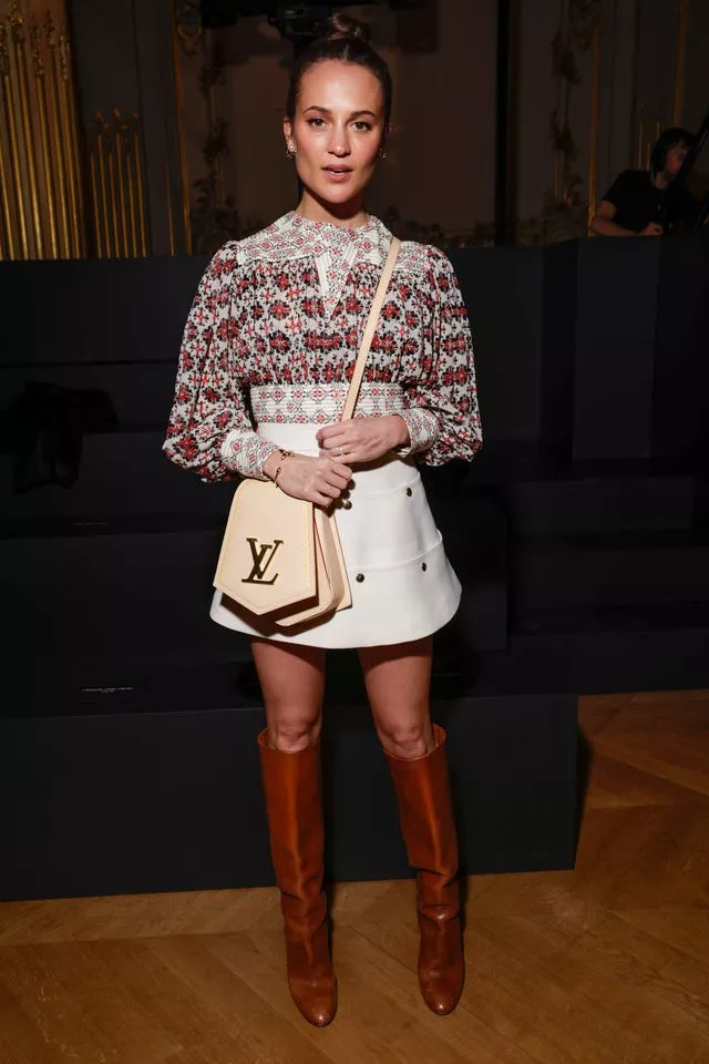 Zendaya leads the celeb trend for knee-high boots at Louis Vuitton fashion  show