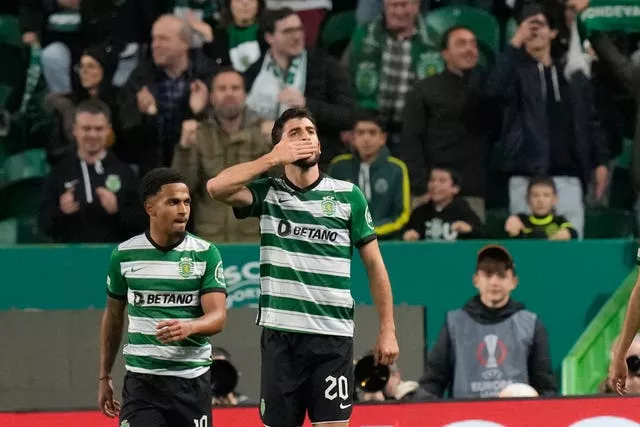 Sporting’s Paulinho celebrates after scoring 