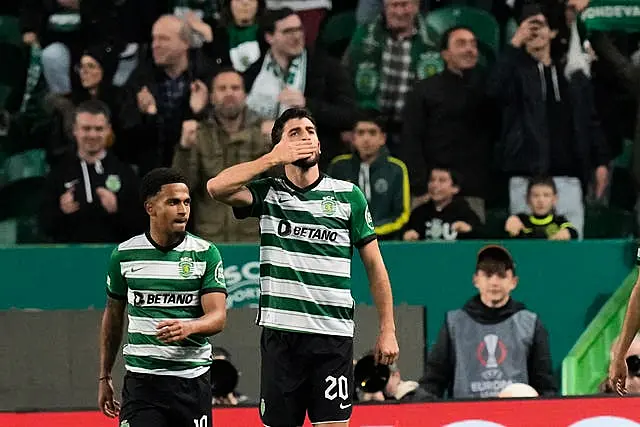 Sporting’s Paulinho celebrates after scoring 