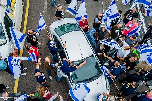 Israelis protest against plans by the government to overhaul the judicial system