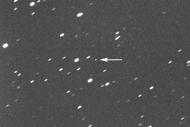 Asteroid 2023 DZ2, indicated by an arrow 