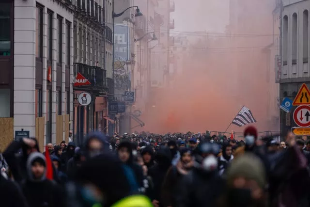 Demonstrators march during a protest in Rennes in western France 