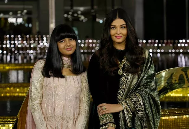 Bollywood actress Aishwarya Rai Bachchan stands for a photograph with her daughter Aaradhya Bachchan during the inaugural function of the Nita Mukesh Ambani Cultural Centre in Mumbai