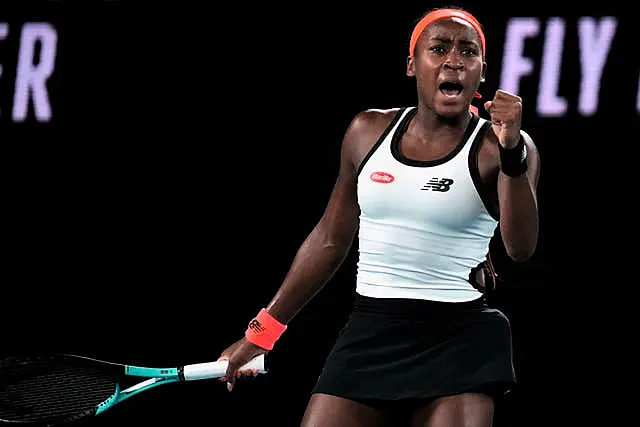 Coco Gauff celebrates during her victory over Emma Raducanu