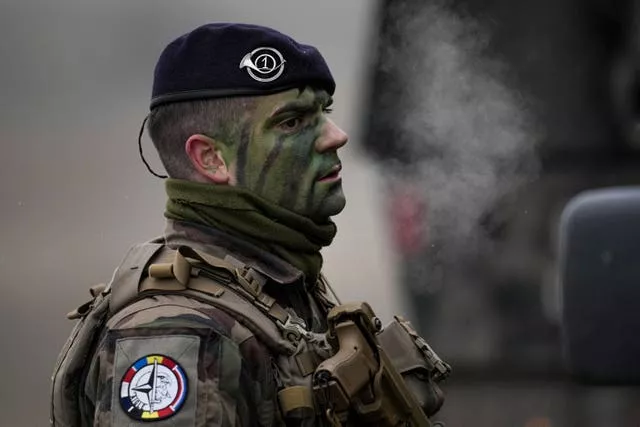 A French serviceman takes part in an exercise at a training range in Smardan, eastern Romania