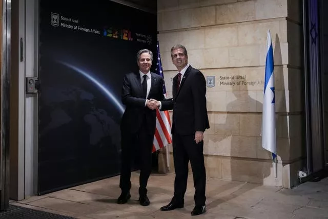 US secretary of state Antony Blinken, left, is welcomed by Israeli minister of foreign affairs Eli Cohen prior to their meeting in Jerusalem