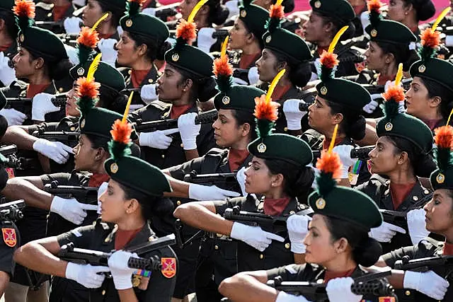 Soldiers march during the ceremony in Colombo 