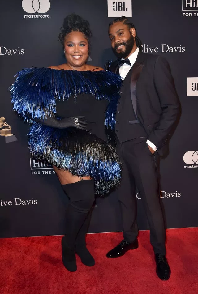 Lizzo and Myke Wright arrive at the Pre-Grammy Gala at the Beverly Hilton hotel in Beverly Hills, California