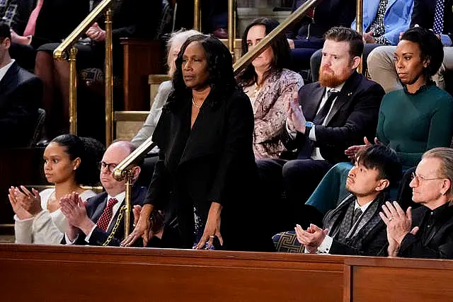 RowVaughn Wells, mother of Tyre Nichols, who died after being beaten by Memphis police officers, stands as she is recognized by President Joe Biden at the State of the Union address