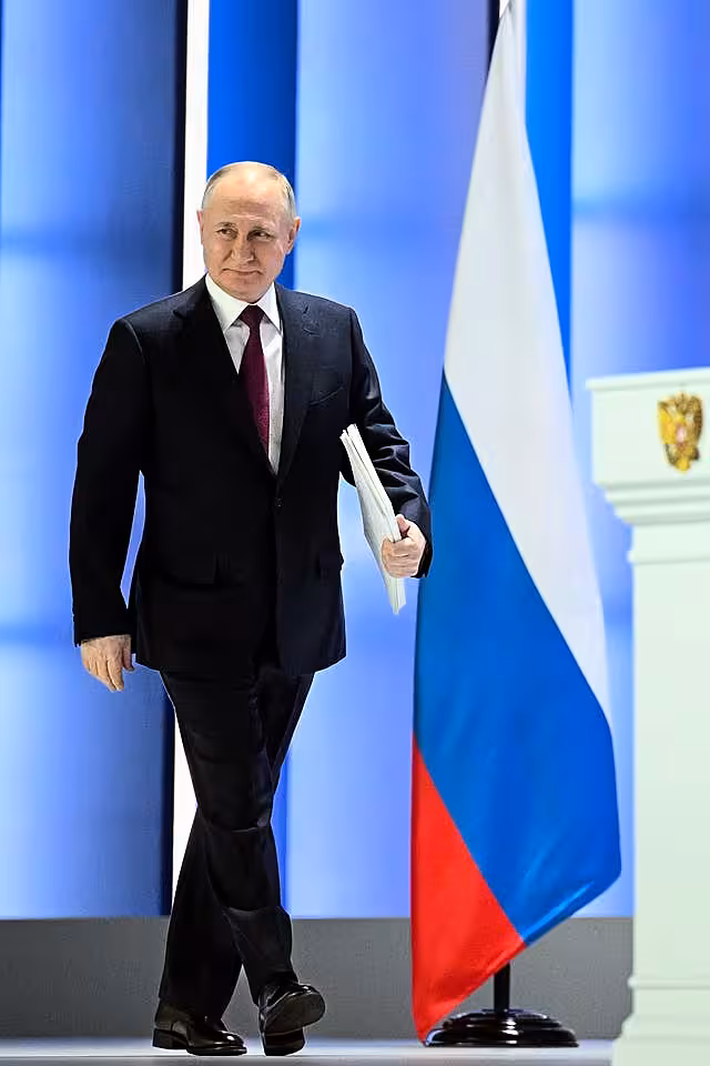 Russian President Vladimir Putin arrives to give his annual state of the nation address in Moscow on Tuesday