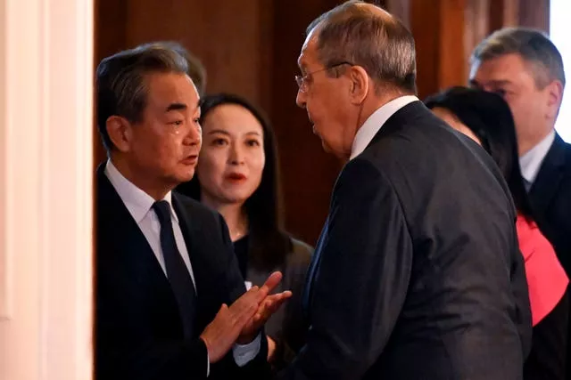 Russian foreign minister Sergei Lavrov, right, and Wang Yi