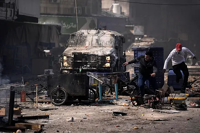 Palestinians clash with Israeli forces in the West Bank city of Nablus