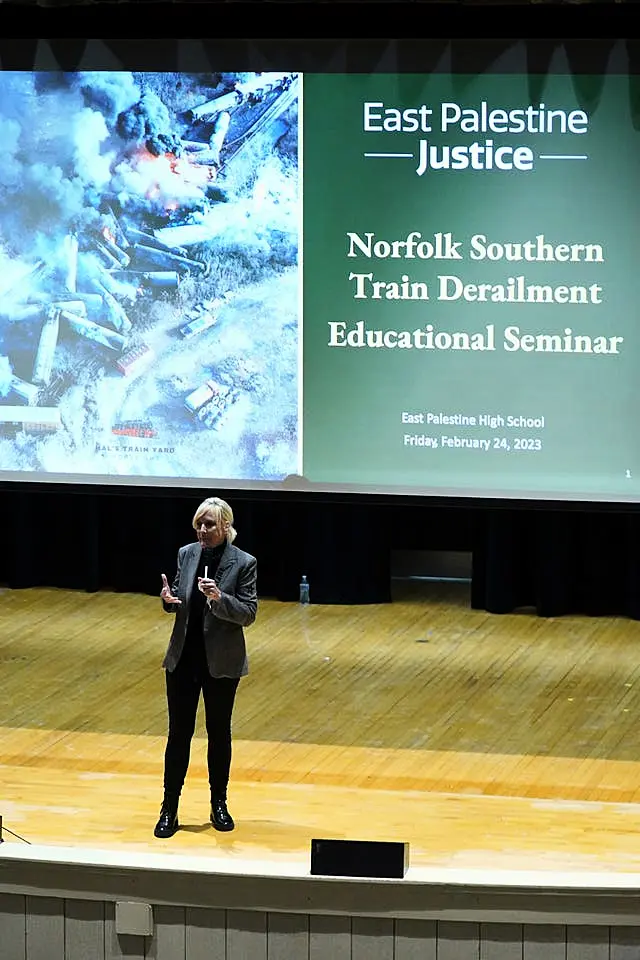 Activist Erin Brockovich speaks during a town hall meeting at East Palestine High School, Ohio