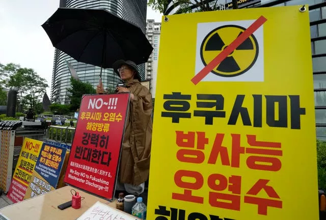 A Buddhist monk protests against the Japanese government’s decision to release treated radioactive wastewater from the damaged Fukushima nuclear power plant