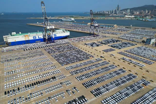 New vehicles for export in a dockyard in Yantai in east China’s Shandong province