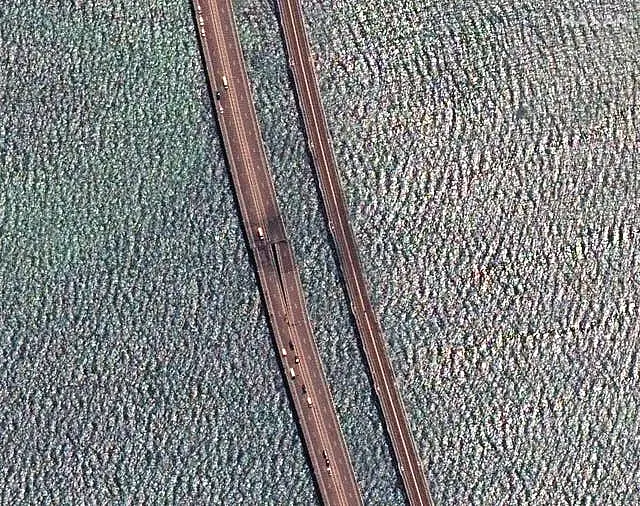 Damaged parts of the bridge connecting Russian mainland and Crimean peninsula over the Kerch Strait