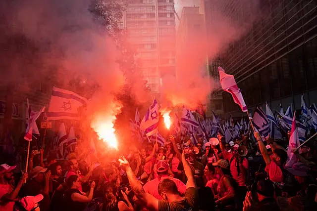 Israelis protest against plans by Prime Minister Benjamin Netanyahu’s government to overhaul the judicial system in Tel Aviv