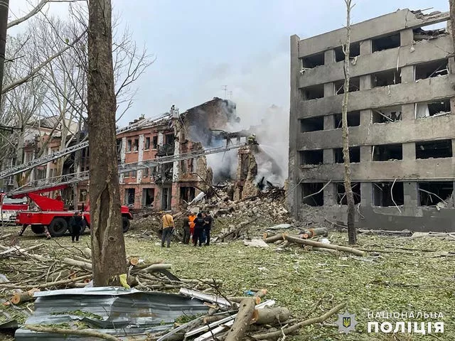 Emergency services work at a building destroyed by a Russian attack in Mykolaiv, Ukraine, on Thursday