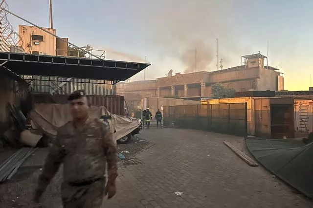 Smoke rises from the Swedish embassy in Baghdad after a small fire was lit 