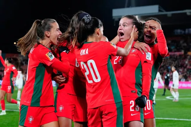 Portugal’s Telma Encarnacao (right) celebrates after scoring against Vietnam (Abbie Parr/AP)
