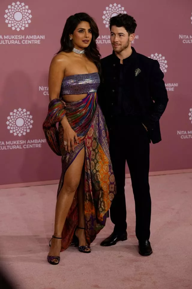 Indian actress Priyanka Chopra and American singer, songwriter and actor Nick Jonas attend the second day inaugural function of the Nita Mukesh Ambani Cultural Centre in Mumbai