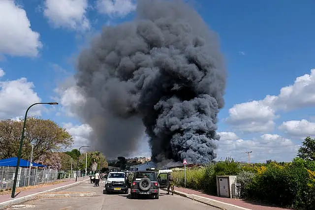 Smoke rises from a fire after rockets fired from Lebanon struck Bezet, northern Israel