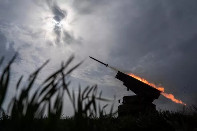 A Ukrainian MSLR BM-21 'Grad' fires towards Russian positions, at the front line in the Donetsk region, Ukraine