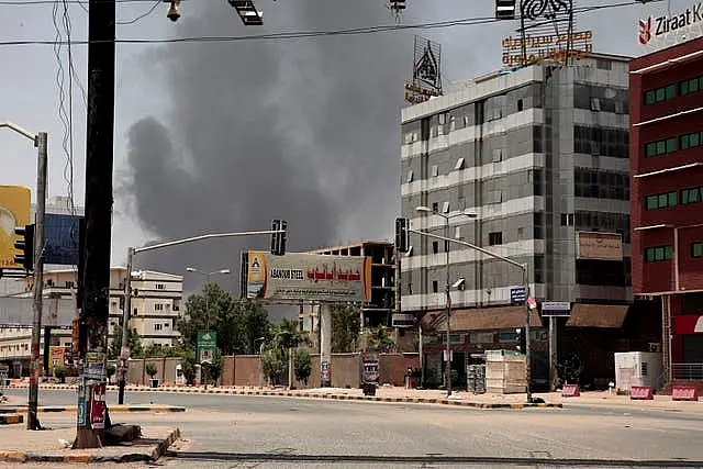 Smoke is seen rising from a neighbourhood in Khartoum, Sudan 