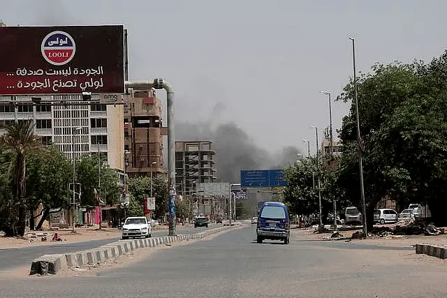 Smoke is seen rising from a neighbourhood in Khartoum, Sudan 