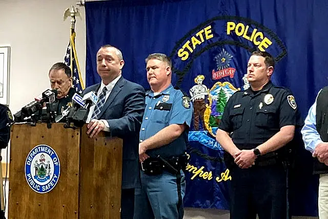 Maine Department of Public Safety Commissioner Mike Sauschuck leads a news conference in Augusta, Maine, about shootings in the state 