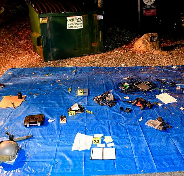 Electronic items allegedly recovered from a bin at the defendant's mother and stepfather’s home